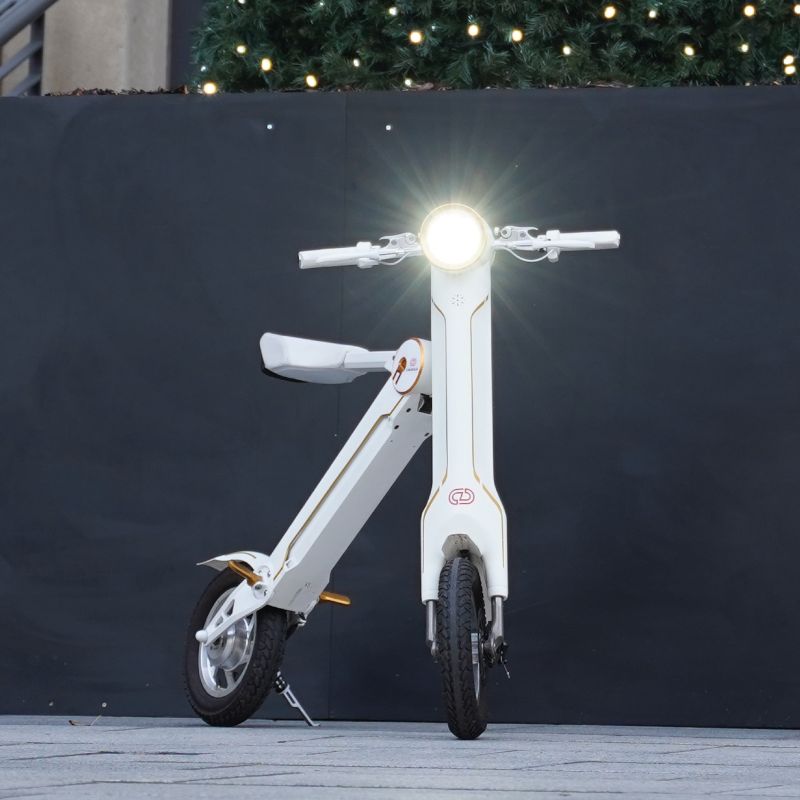 Cruzaa Carbon White Electric Scooter With Built-in Speakers & Bluetooth