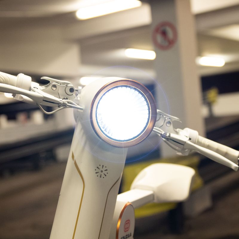 Cruzaa Carbon White Electric Scooter With Built-in Speakers & Bluetooth